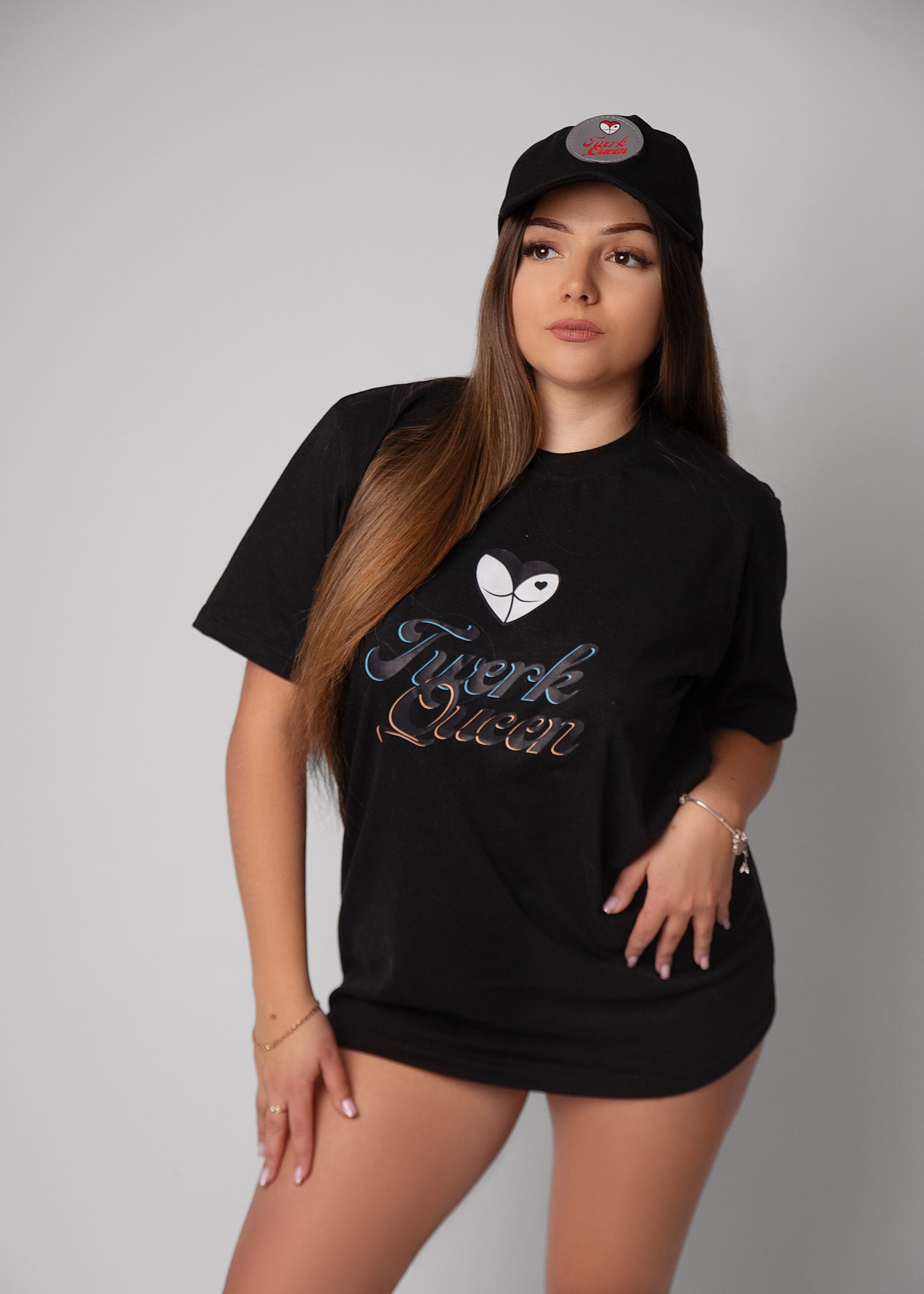 dancewear london for women. twerk clothes, twerk shorts. booty shorts, chain shorts, cut out twerk shorts, dance costume. twerk outfit. pole dance outfit, best twerk shorts. festival wear, oversized black t-shirt, twerk queen t-shirt, black t-shirt.