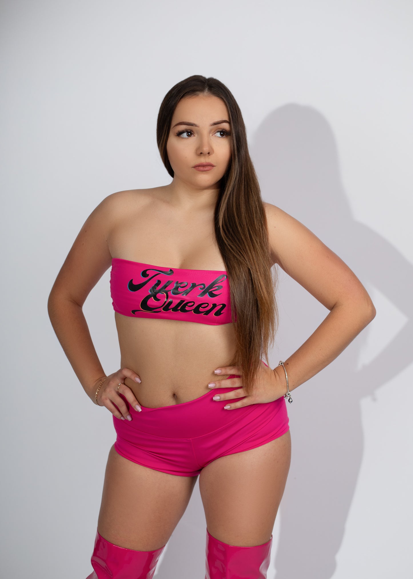 dancewear london for women. twerk clothes, twerk shorts. booty shorts, chain shorts, cut out twerk shorts, dance costume. twerk outfit. pole dance outfit, best twerk shorts. festival wear, pink crop top, pink twerk queen crop top.