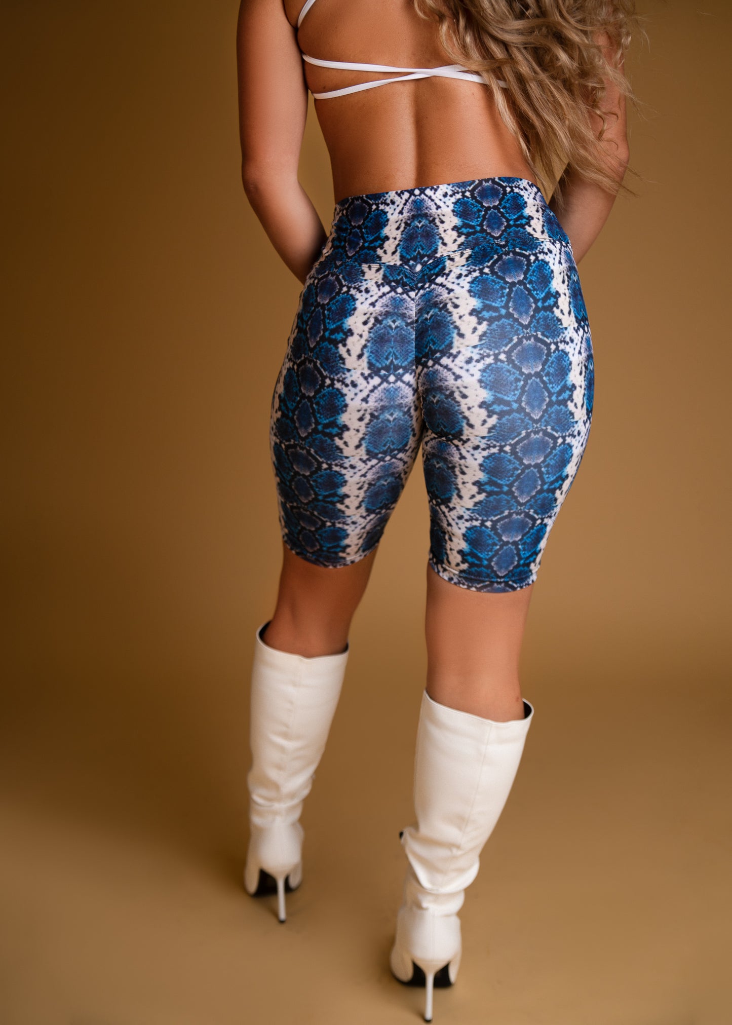 dancewear london for women. twerk clothes, twerk shorts. blue twerk shorts, booty shorts, chain shorts, cut out twerk shorts, dance costume. twerk outfit. pole dance outfit, best twerk shorts. festival wear, snake print blue shorts, biker shorts, long coverage shorts.